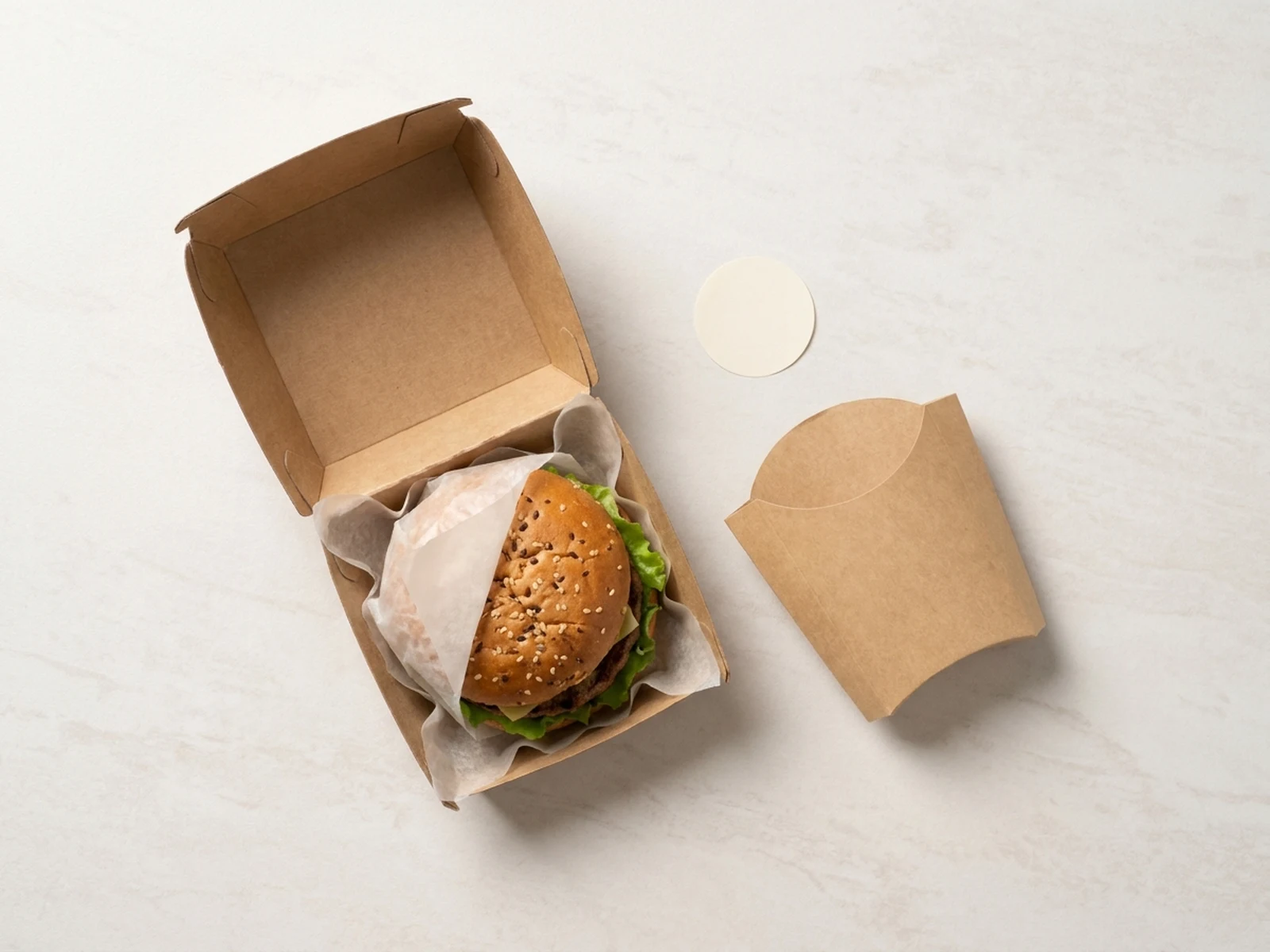 Burger takeaway packaging board with box, wrapper, sticker, and fry sleeve