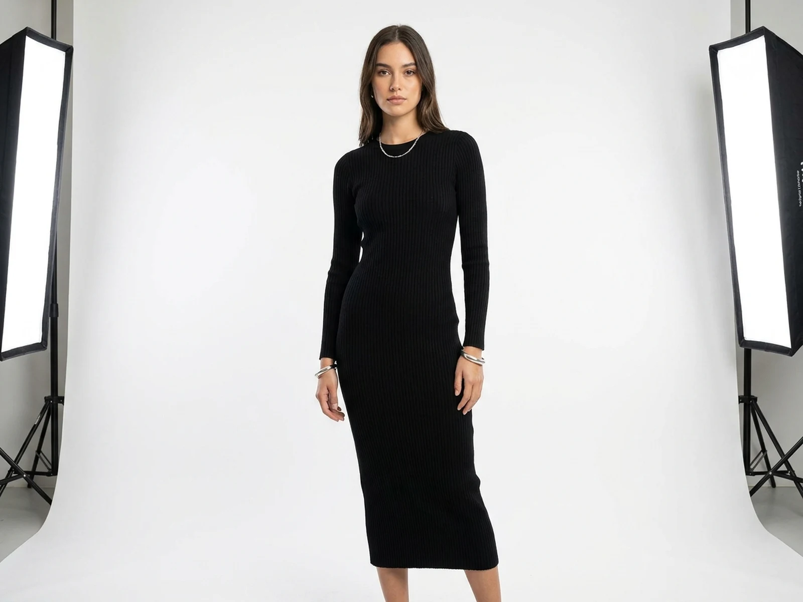 AI dress generator example showing black knit dress ecommerce catalog shot