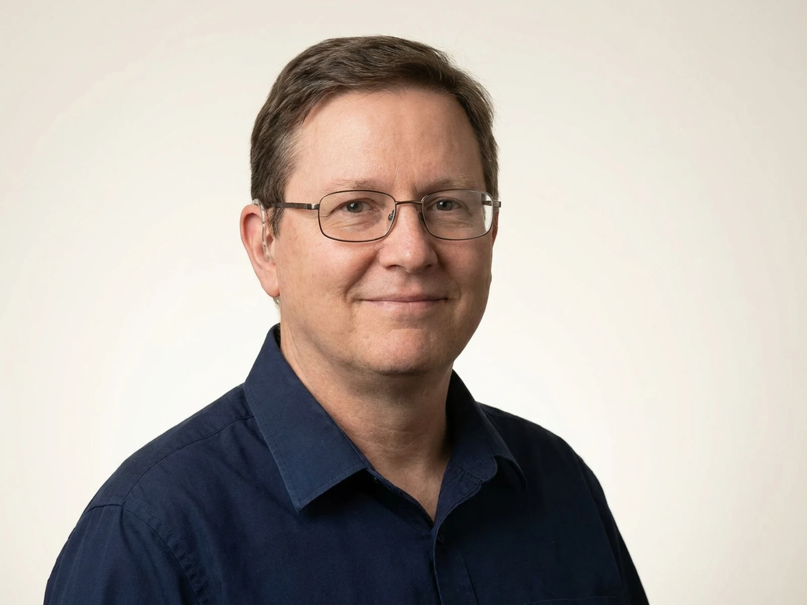 Warm-white professional profile headshot preview