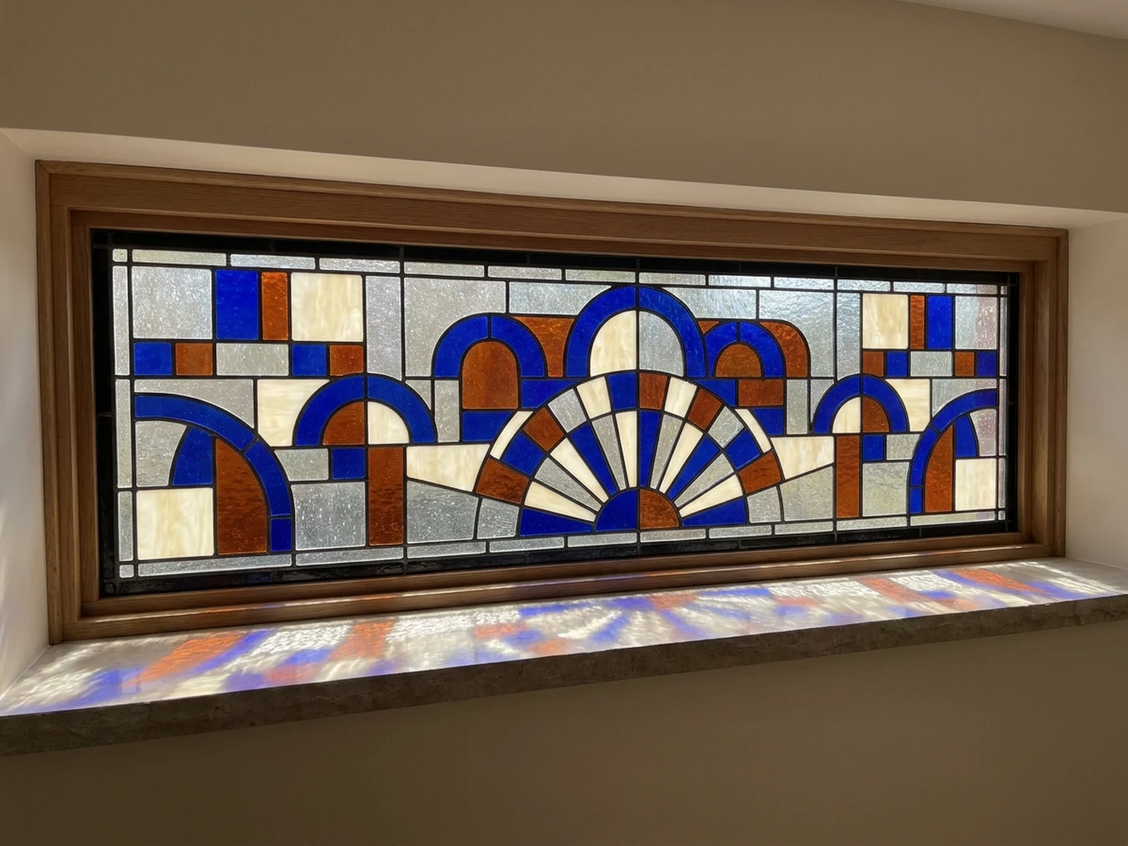 Original geometric stained glass transom panel