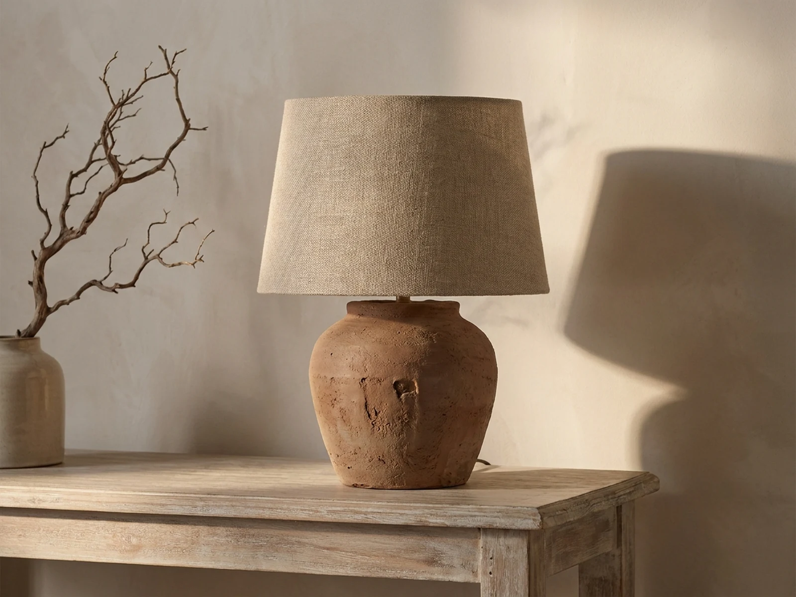 AI generated terracotta table lamp product photo for home decor catalog